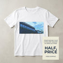 Racing Cityscape T-Shirt — Yellow Sports Car Track Scene Printify