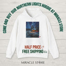 Northern Lights Cabin Hoodie – Cozy Winter Night Aurora Sweatshirt Printify